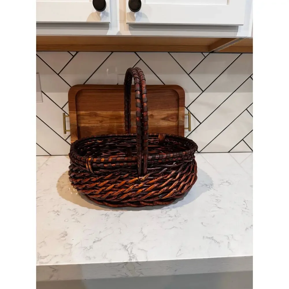 dark stained willow basket rustic handwoven texture sturdy center handle vintage